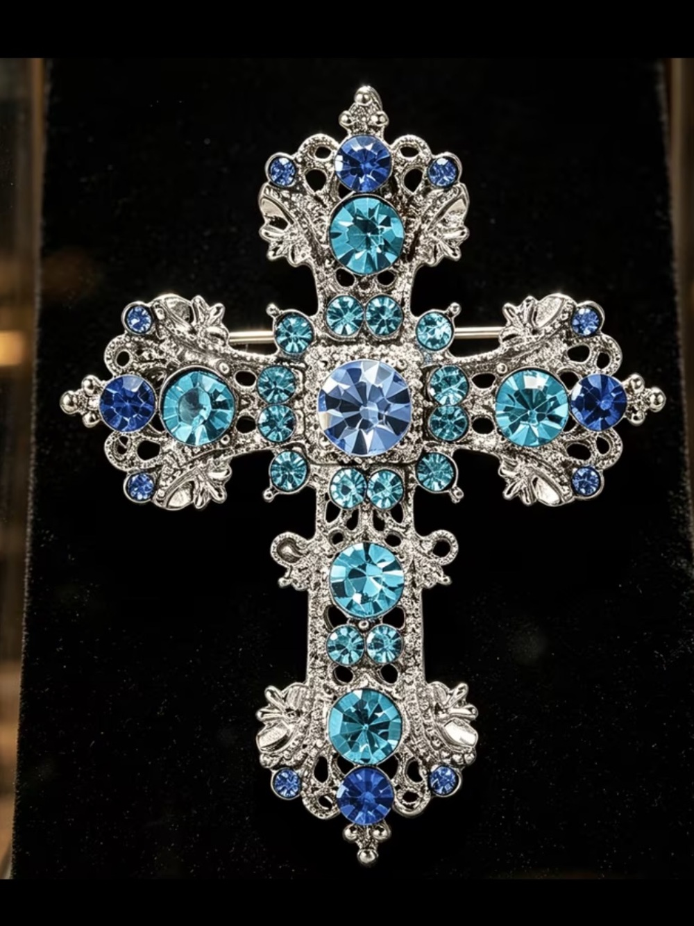 Silver Filigree Cross Brooch with Blue Crystal Accents